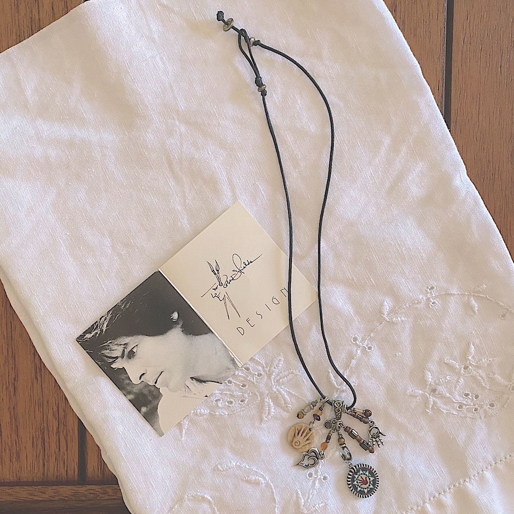 Robert Shields charm necklace 18.5 inches.